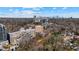 Scenic aerial view of a community surrounded by lush greenery and city skyline at 2255 Peachtree Ne Rd # 426, Atlanta, GA 30309
