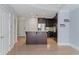 Well-lit kitchen with a stylish island, stainless steel appliances, and dark wood cabinetry at 2255 Peachtree Ne Rd # 426, Atlanta, GA 30309