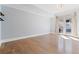 Open-concept living room with hardwood floors and a balcony that provides natural light at 2255 Peachtree Ne Rd # 426, Atlanta, GA 30309