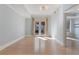 Bright living room with hardwood floors and a balcony that provides natural light at 2255 Peachtree Ne Rd # 426, Atlanta, GA 30309