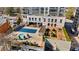 Outdoor pool area with a hot tub, decorative garden, pergola and patio area for entertaining at 2255 Peachtree Ne Rd # 426, Atlanta, GA 30309