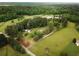 Expansive property featuring multiple ponds surrounded by lush forests at 7275 Bishop Rd, Fairburn, GA 30213