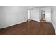 Bright room boasts hard floors, ceiling fan, and easy access to kitchen and closet at 8005 Bamby Ln, Jonesboro, GA 30236