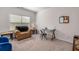 Bedroom featuring a comfy chair, glass desk, and natural light at 116 Holly View Ln, Canton, GA 30114