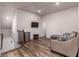 Relaxing bonus room with mini fridge and comfortable seating at 116 Holly View Ln, Canton, GA 30114