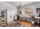 Bright home office with large window, ample storage, and natural light at 116 Holly View Ln, Canton, GA 30114