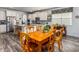 Spacious kitchen features stainless appliances, granite countertops, and island with seating at 116 Holly View Ln, Canton, GA 30114
