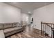 Comfortable couch in an upstairs room with easy access to bedroom and bathroom at 116 Holly View Ln, Canton, GA 30114