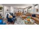 Open-concept layout showing a living room flowing into a dining area and kitchen, with stylish decor and comfortable furnishings at 116 Holly View Ln, Canton, GA 30114