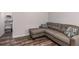 Cozy living area with a sectional couch and direct access to the closet at 116 Holly View Ln, Canton, GA 30114