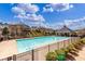 Community swimming pool with a well-maintained deck and a covered seating area at 116 Holly View Ln, Canton, GA 30114