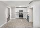 Updated kitchen features new appliances and white cabinetry at 2653 Del Ridge Dr, Douglasville, GA 30135
