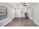 Bright and airy living room with wood flooring and a staircase at 2653 Del Ridge Dr, Douglasville, GA 30135