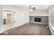 Open-concept living room with fireplace connected to the updated kitchen at 2653 Del Ridge Dr, Douglasville, GA 30135