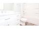 Modern bathroom with marble vanity, tub-shower combination, and wood-look vinyl flooring at 3374 Thornbridge Dr, Powder Springs, GA 30127