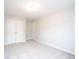 Bright bedroom features neutral carpeting, large closets and ample natural light at 3374 Thornbridge Dr, Powder Springs, GA 30127
