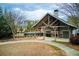 Clubhouse exterior, with picnic pavilion, stone fireplace, and community space at 3374 Thornbridge Dr, Powder Springs, GA 30127