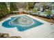Exterior aerial view of a covered community pool surrounded by parking at 3374 Thornbridge Dr, Powder Springs, GA 30127
