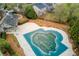 Aerial view of a community pool covered by a tarp for the off season at 3374 Thornbridge Dr, Powder Springs, GA 30127