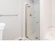 Bright bathroom featuring a shower with a glass door and brushed metal hardware at 3374 Thornbridge Dr, Powder Springs, GA 30127