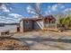 Charming lake house with a wooden deck, providing a peaceful retreat by the water at 885 Malcom Rd, Covington, GA 30014
