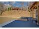 Lake house with a deck overlooking the water and steps down to the lake at 885 Malcom Rd, Covington, GA 30014