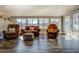 Cozy living room showcasing lake views through expansive windows and french doors at 885 Malcom Rd, Covington, GA 30014
