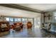 Inviting living room featuring large windows with lake view and comfortable seating at 885 Malcom Rd, Covington, GA 30014