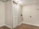 Utility area featuring clean neutral paint, and hardwood style floors at 2239 Pinewood Dr, Decatur, GA 30032