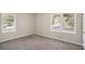 Bright bedroom with two windows for an abundance of natural light at 2239 Pinewood Dr, Decatur, GA 30032