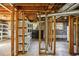 This unfinished basement features exposed beams, concrete walls, and exposed ductwork at 860 Valleymeade Se Dr, Marietta, GA 30067