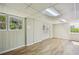 The basement features luxury vinyl plank floors, white walls, and natural light from the windows at 860 Valleymeade Se Dr, Marietta, GA 30067
