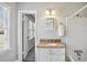 Bathroom featuring granite countertop vanity and shower-tub combination at 860 Valleymeade Se Dr, Marietta, GA 30067