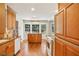 Well-lit kitchen with wooden cabinets, granite countertops and a view from the bay window at 860 Valleymeade Se Dr, Marietta, GA 30067