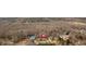 Aerial view of a wooded neighborhood with mature trees, tennis court and community pool at 1293 Wynford Colony Sw, Marietta, GA 30064