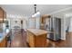 Kitchen with stainless steel fridge, kitchen island, and breakfast table at 1293 Wynford Colony Sw, Marietta, GA 30064