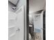 This bathroom features a white shower and a gray vanity with a white sink, offering a modern look at 3068 River Oak Rd, Decatur, GA 30034