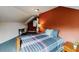 Bedroom with a desk and chair, bed, and a warm light from bedside lamp at 3068 River Oak Rd, Decatur, GA 30034