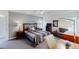 Bedroom with desk and chair, bed, and a warm light from bedside lamp at 3068 River Oak Rd, Decatur, GA 30034