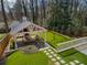 Aerial view of home showing cabana area, patio, and surrounding landscape at 3125 Peachtree Ne Dr, Atlanta, GA 30305