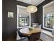 Inviting breakfast nook with ample windows and a cozy built-in bench seating at 3125 Peachtree Ne Dr, Atlanta, GA 30305
