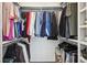 Organized closet featuring shelving and hanging rods for ample storage at 3125 Peachtree Ne Dr, Atlanta, GA 30305