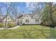 Charming single-Gathering home boasts a manicured lawn and classic architectural details at 3125 Peachtree Ne Dr, Atlanta, GA 30305