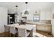 Spacious eat-in kitchen featuring pendant lights and marble countertop island with seating at 3125 Peachtree Ne Dr, Atlanta, GA 30305