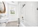 Well-lit bathroom with subway tiled shower and modern fixtures at 1007 S Candler St, Decatur, GA 30030