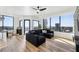 Living room with floor-to-ceiling windows offering panoramic city views at 2828 Peachtree Nw Rd # 1701, Atlanta, GA 30305