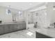 Luxurious bathroom with a soaking tub, marble countertops, and elegant fixtures at 52 25Th Nw St, Atlanta, GA 30309