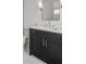 Modern bathroom with a vanity featuring a dark wood cabinet and a white countertop at 52 25Th Nw St, Atlanta, GA 30309