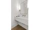 Contemporary bathroom with a marble countertop and sleek, modern fixtures at 52 25Th Nw St, Atlanta, GA 30309