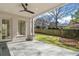 Covered patio area offering a beautiful backyard view and a ceiling fan at 52 25Th Nw St, Atlanta, GA 30309